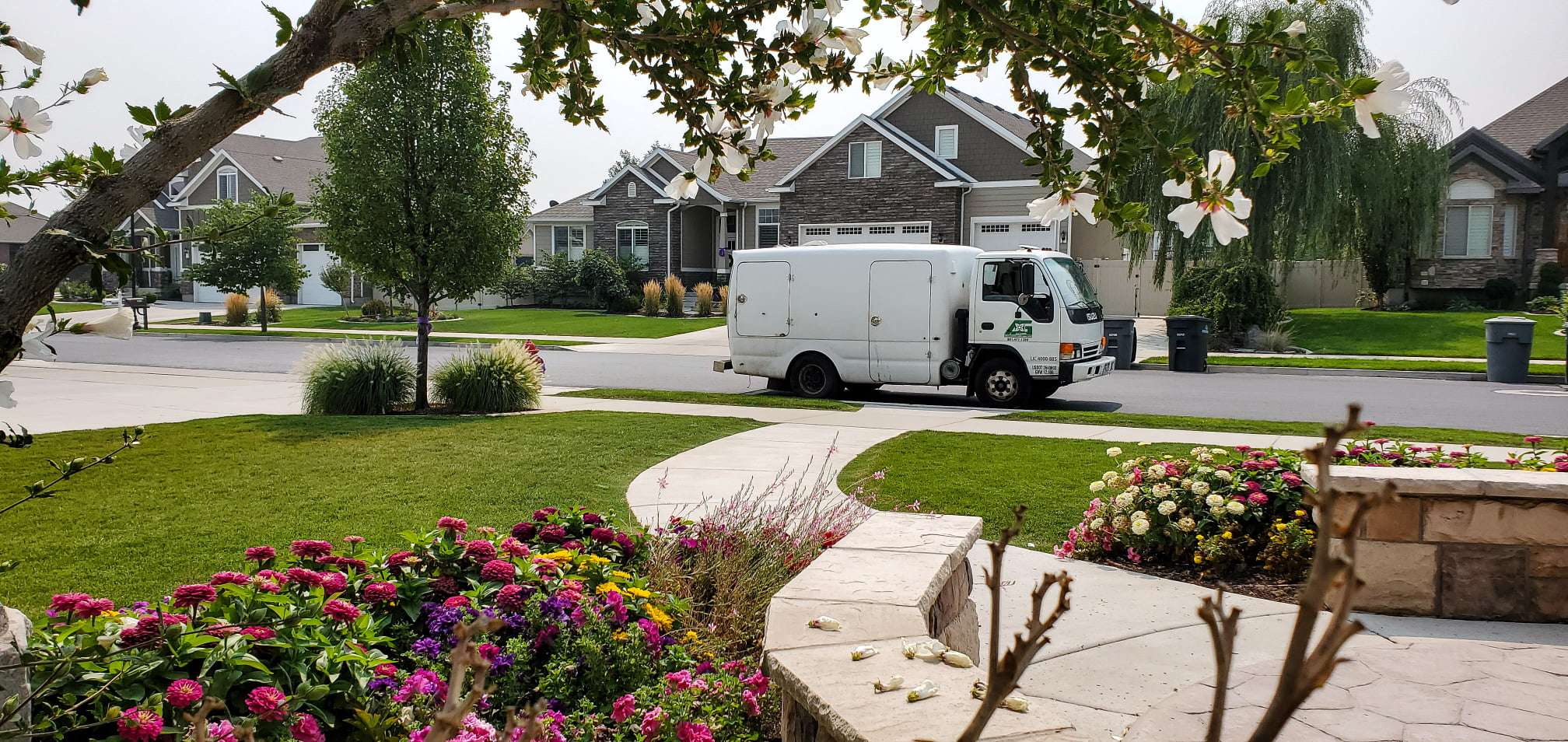All Green Pest Control truck outside of client home